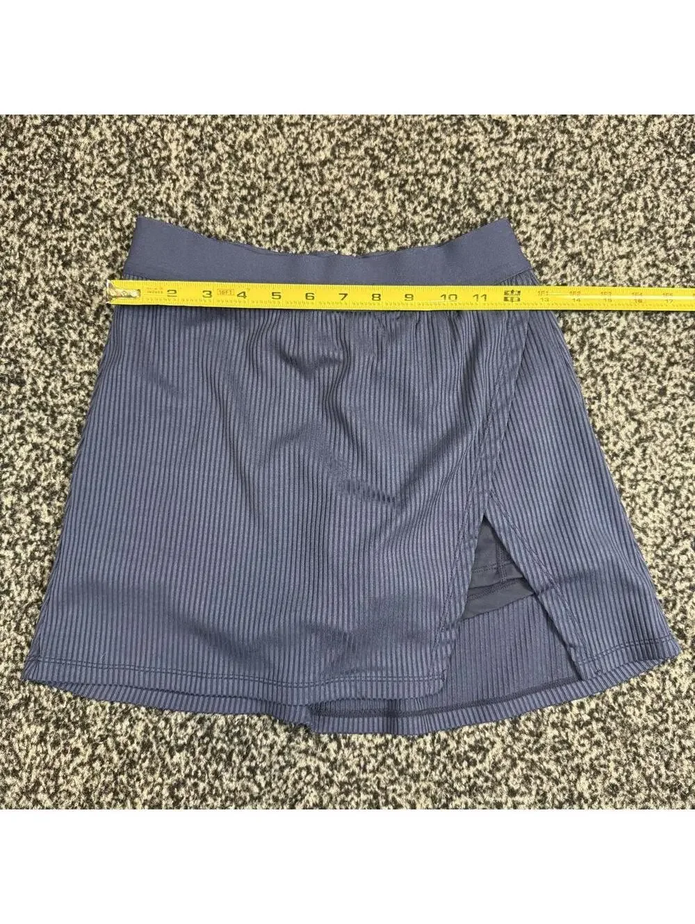 Navy blue mini skirt with thin vertical stripes
